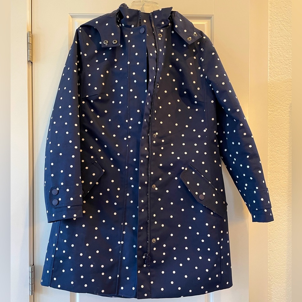 Boden brand Mac navy and white dot raincoat with lining.